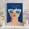 Le souvenir tendance à ramener de vos vacances au Cap d'Agde. Affiche d'une femme en bleu.